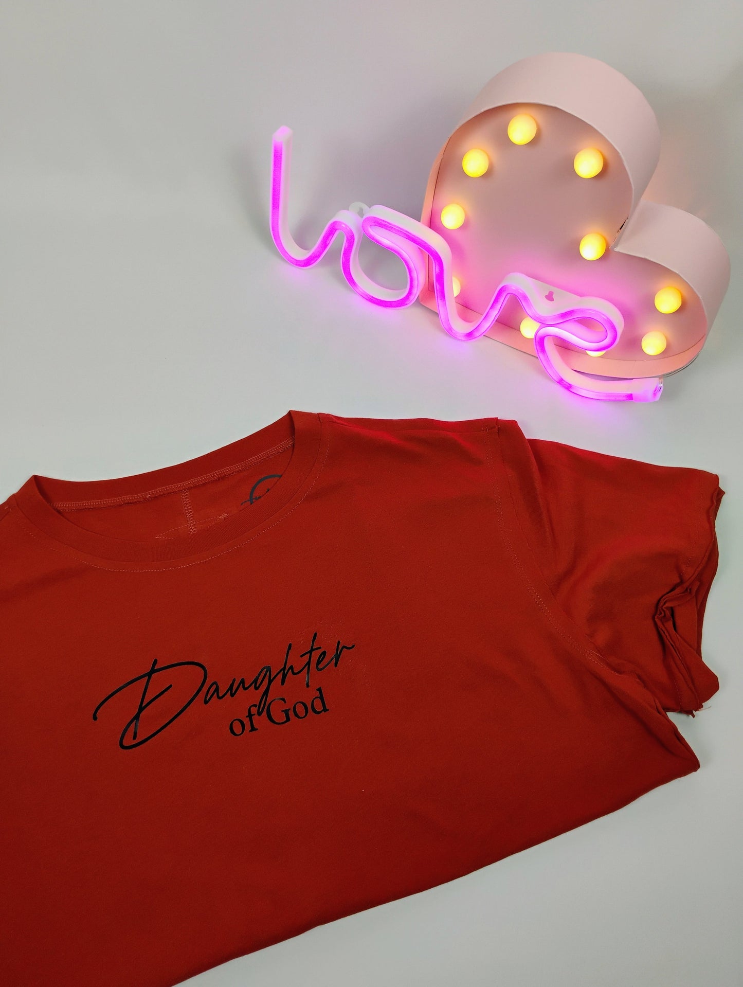 Daughter of God Boxy SS Tee- Rust with black text